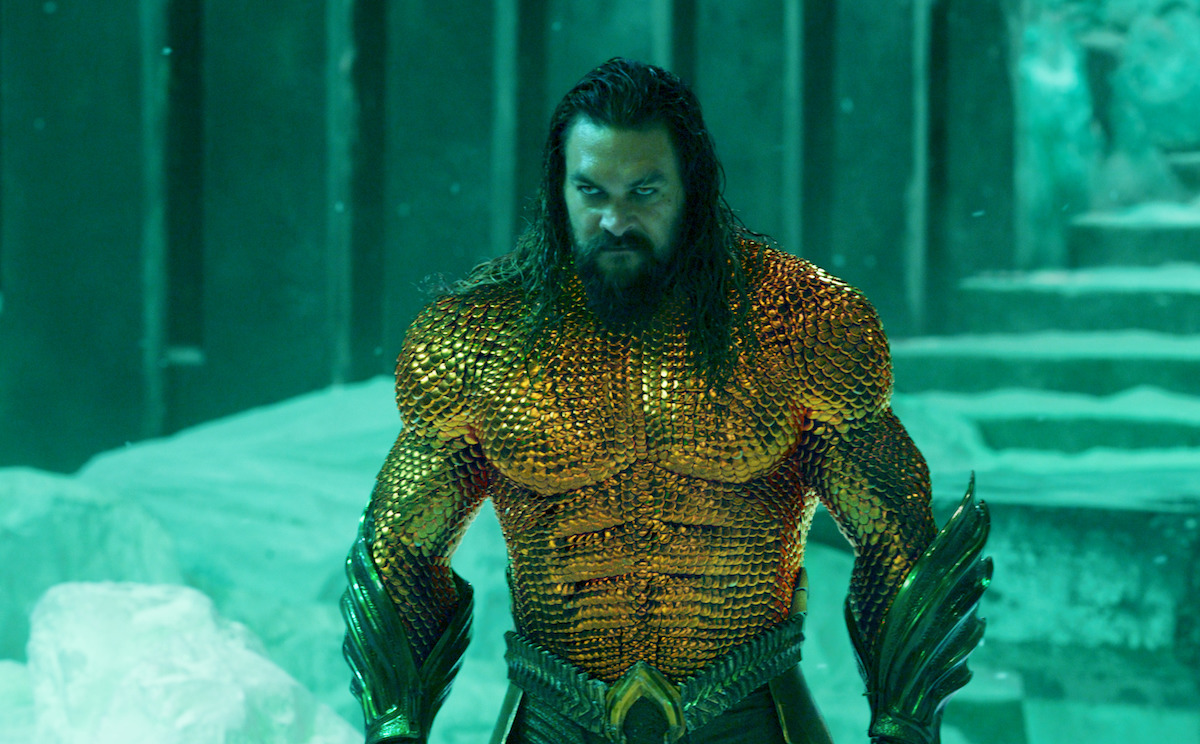 Arthur Curry a.k.a. Aquaman stands in a cave made of ice.