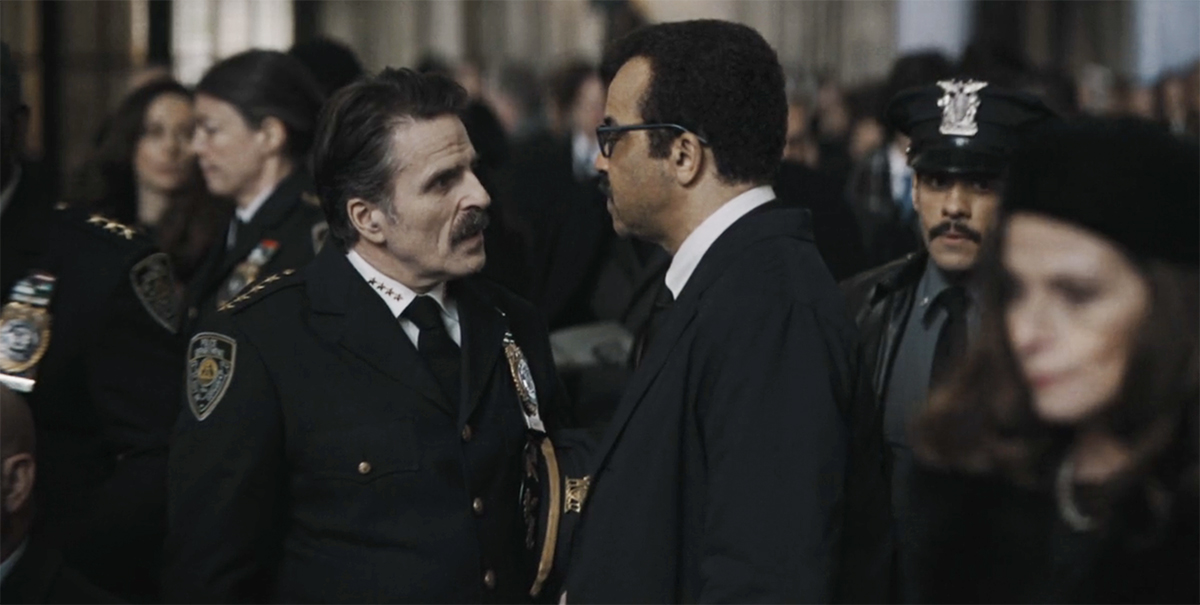 Con O'Neill as Chief Mackenzie Bock in the Batman talking to Gordon