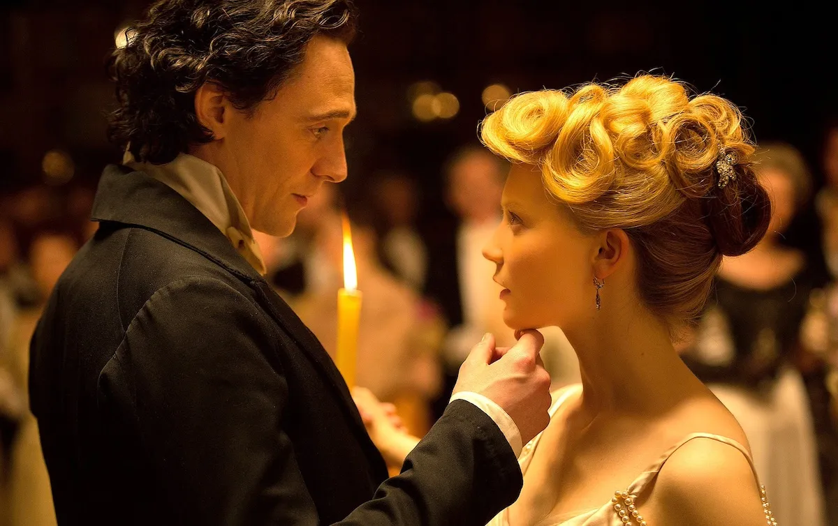 Tom Hiddleston and Mia Wasikowska in a scene from 'Crimson Peak' 