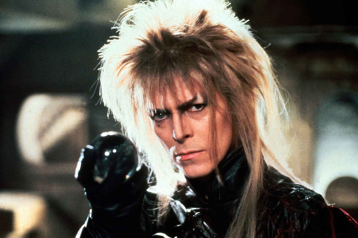 Jareth the Goblin King holding his crystal ball in Labyrinth