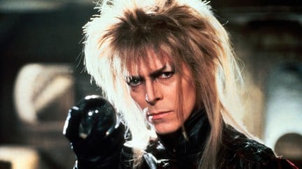 Jareth the Goblin King holding his crystal ball in Labyrinth