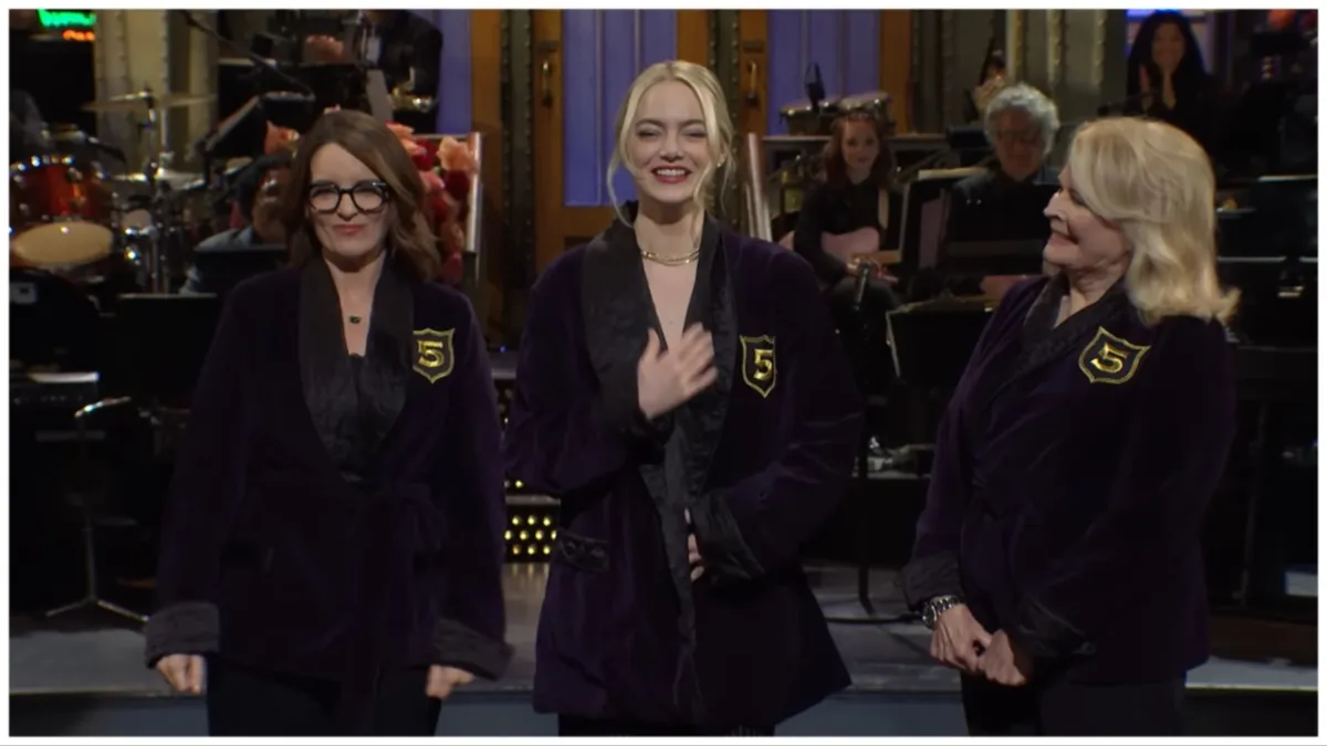 Tina Fey, Emma Stone, and Candice Bergen all wear Five Timers smoking jackets on stage at 'Saturday Night Live'.
