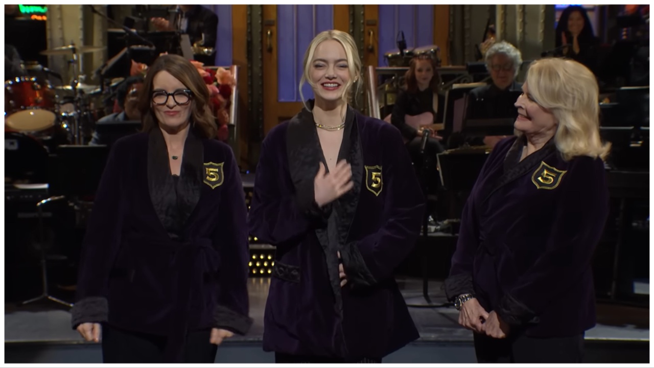 Tina Fey, Emma Stone, and Candice Bergen all wear Five Timers smoking jackets on stage at 'Saturday Night Live'.