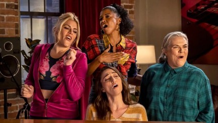 Busy Philipps, Renee Elise Goldsberry, Sara Bareilles, and Paula Pell sing together in 'Girls5Eva'.