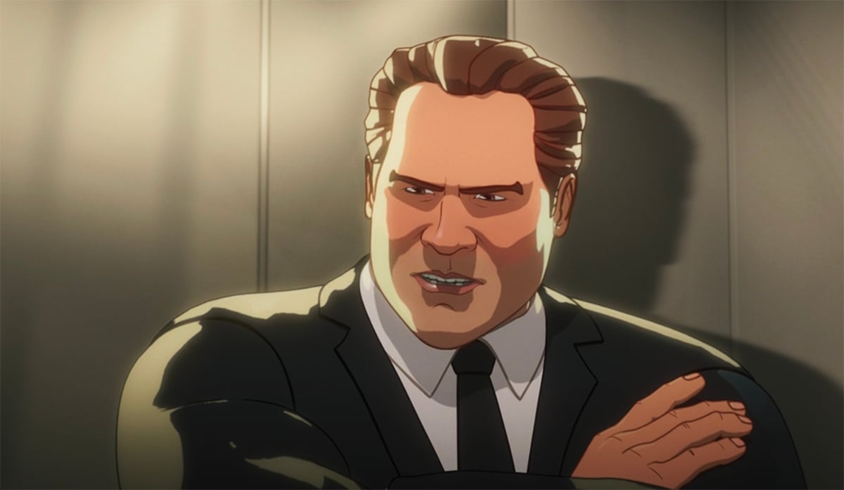 Happy Hogan holding his arm in an elevator in Avengers Tower