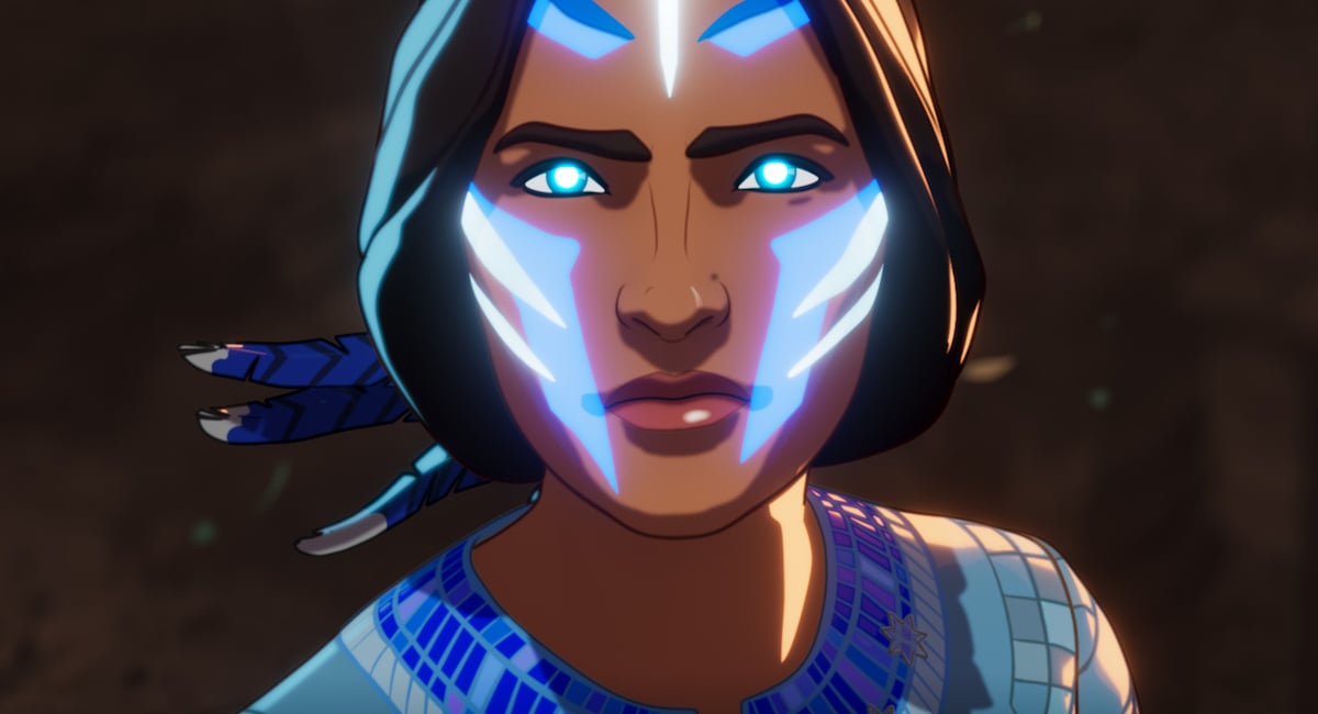 Kahhori looks up, her eyes glowing blue.