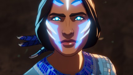 Kahhori looks up, her eyes glowing blue.