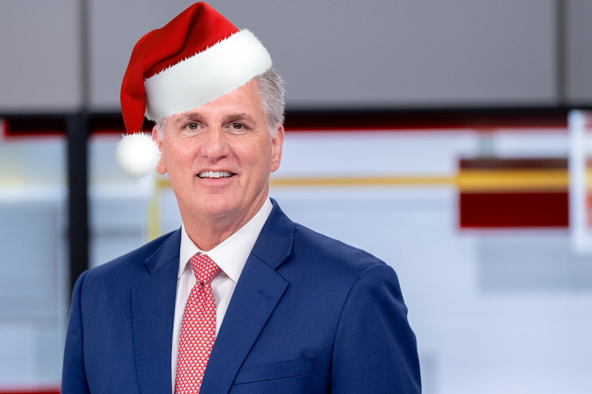 Kevin McCarthy smiles with a Santa hat superimposed on his head
