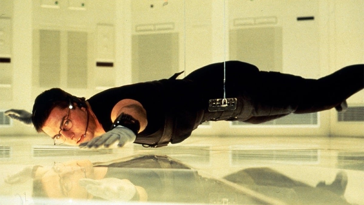 A spy hangs above the floor suspended by a wire in "Mission Impossible: