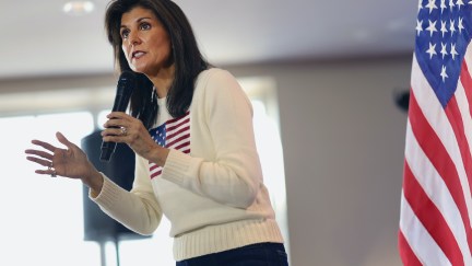 Nikki Haley speaks into a microphone during a town hall event.