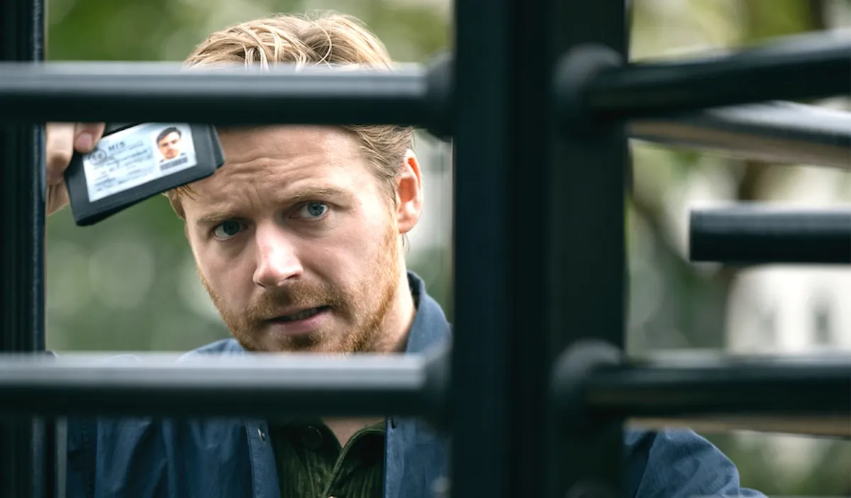 Jack Lowden holds his badge as River Cartwright in 'Slow Horses' season 3