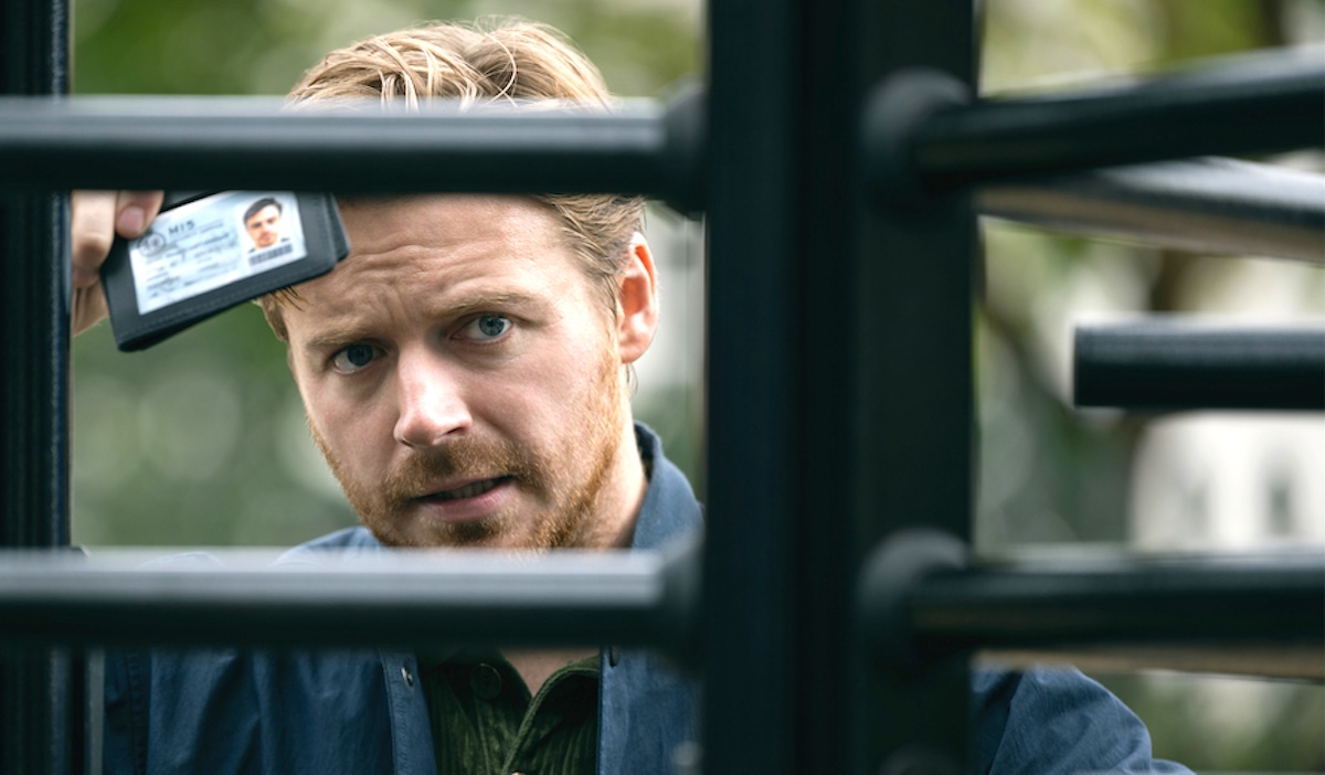 Jack Lowden holds his badge as River Cartwright in 'Slow Horses' season 3