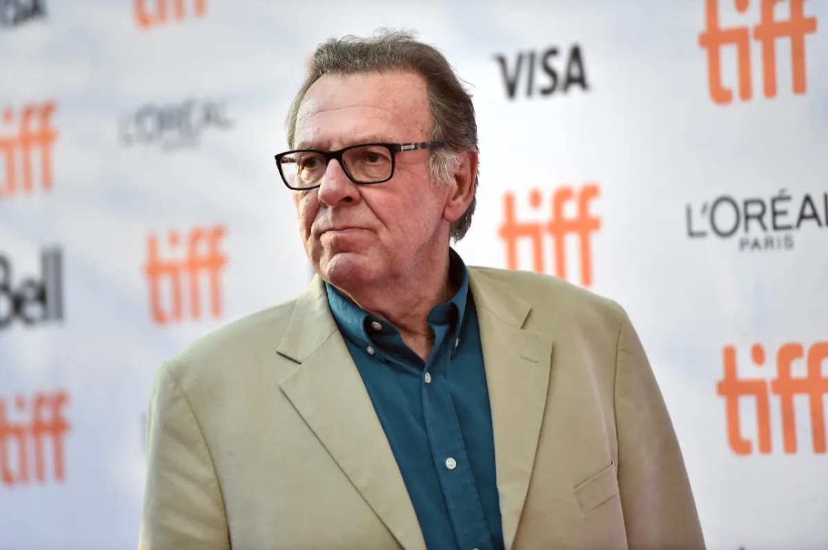 Tom Wilkinson in a blue shirt and tan coat at the Toronto International Film Festival.