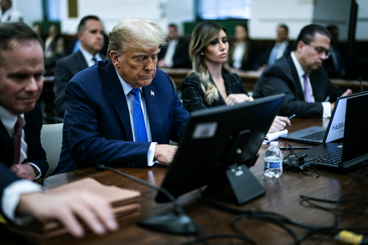 Donald Trump sits in court looking sad