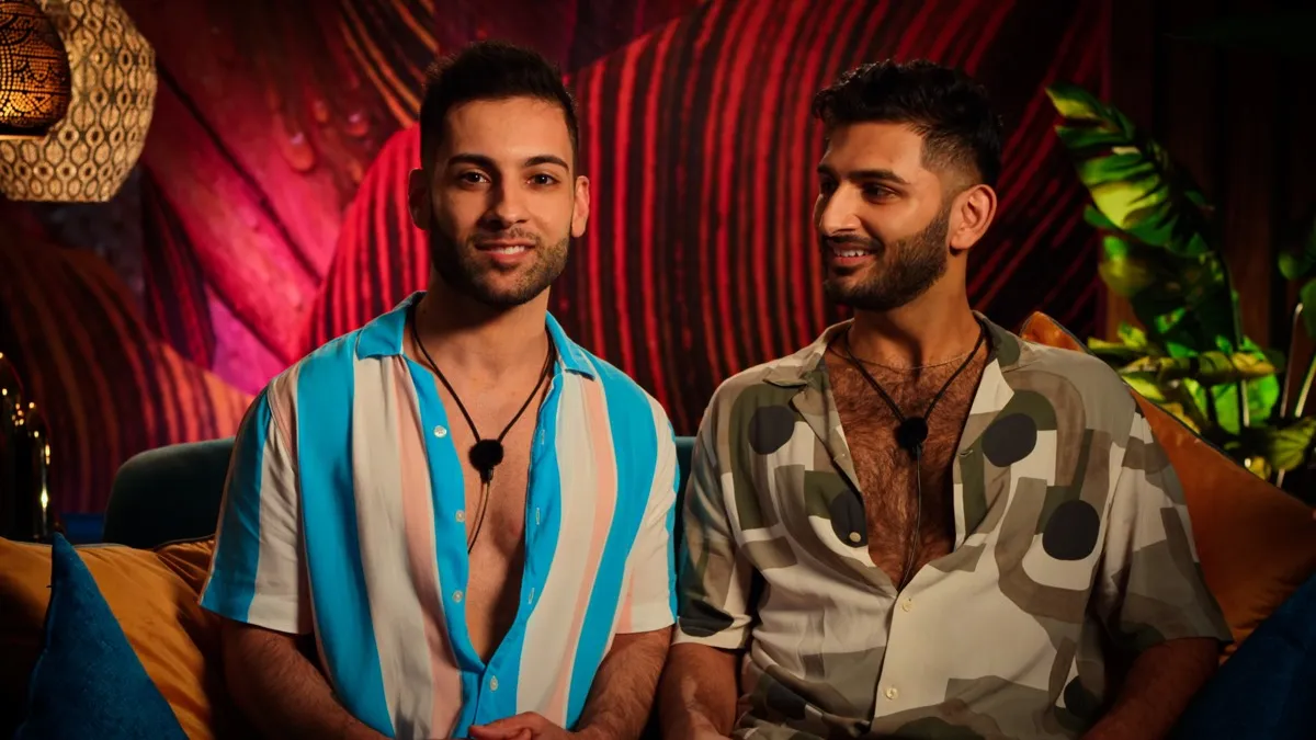 Ashmal and Rehman, two participants in Peacock's new reality series, 'Couple to Throuple'