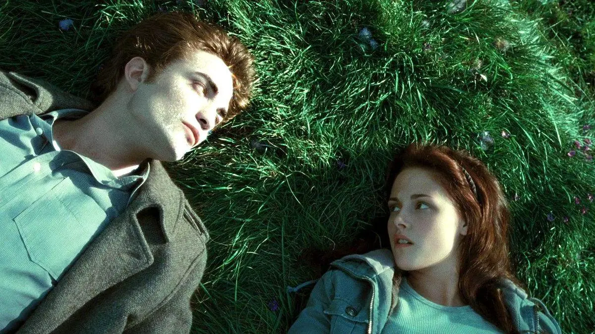 Edward (Robert Pattinson) and Bella (Kristen Stewart) sparkle in the sun in 'Twilight.'