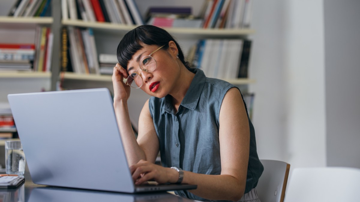 Upset woman at laptop