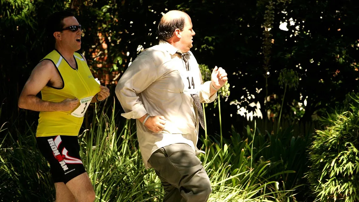 Andy (Ed Helms) and Kevin (Brian Baumgartner) doing a fun run on The Office