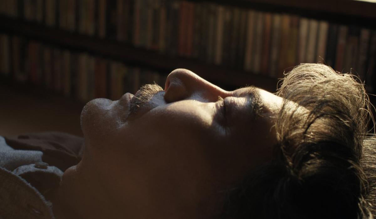 Hirayama listening to music from Perfect Days, Japan's Winning 2024 Academy Award Entry for International Feature Film