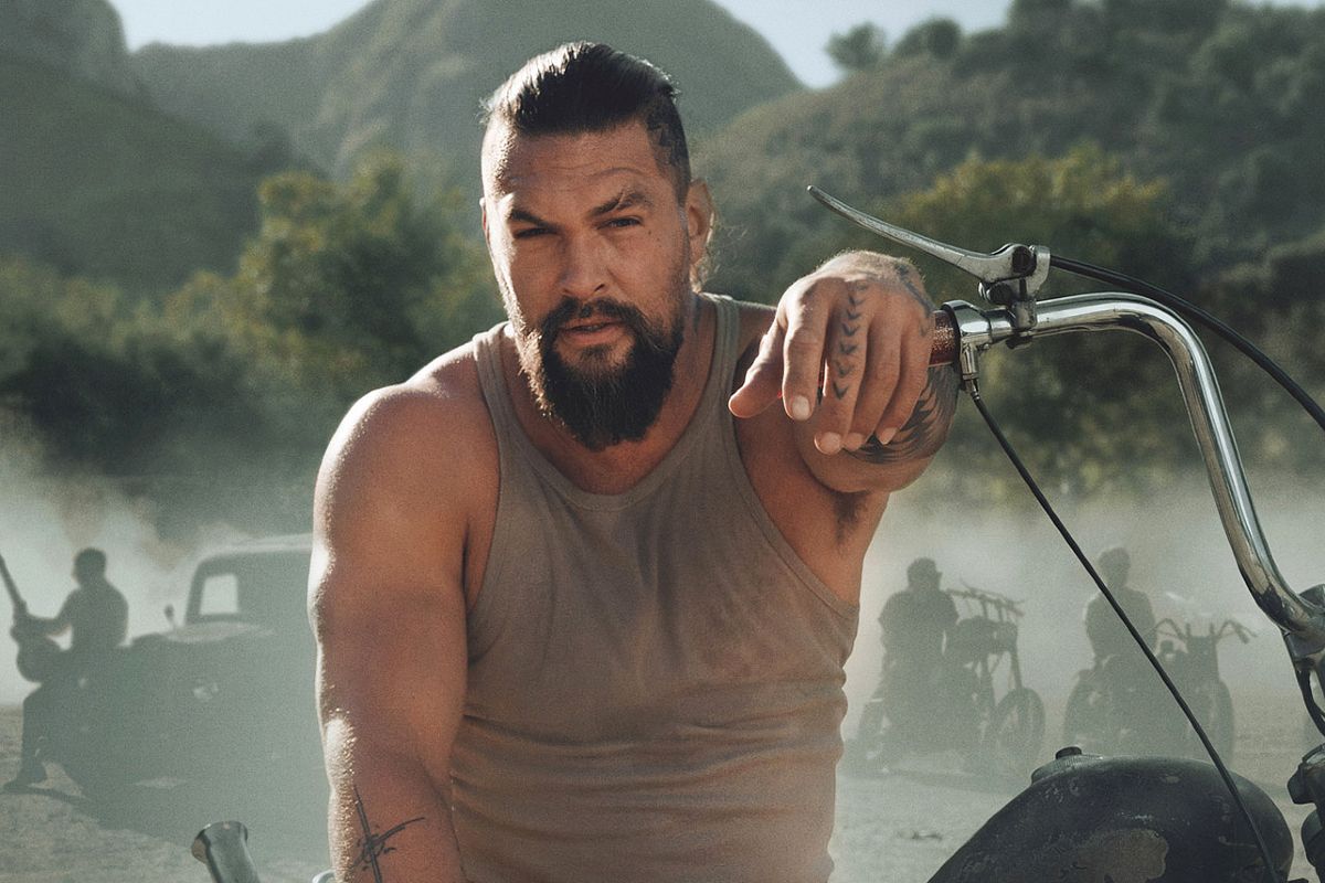 Jason Momoa on the back of a motorcycle for 'On the Roam.'