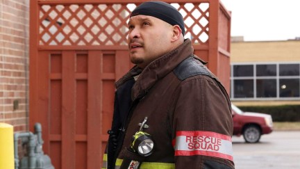 Joe Cruz looks at a building in 'Chicago Fire.'