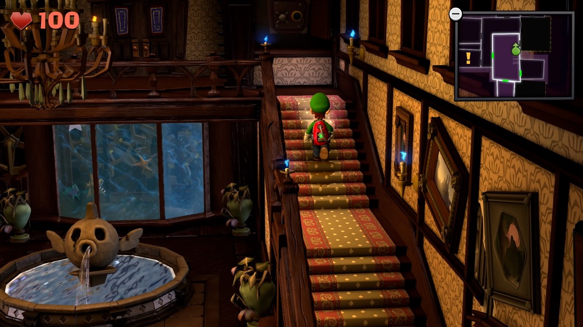 Luigi walks up a spooky staircase in "Luigi's Mansion"