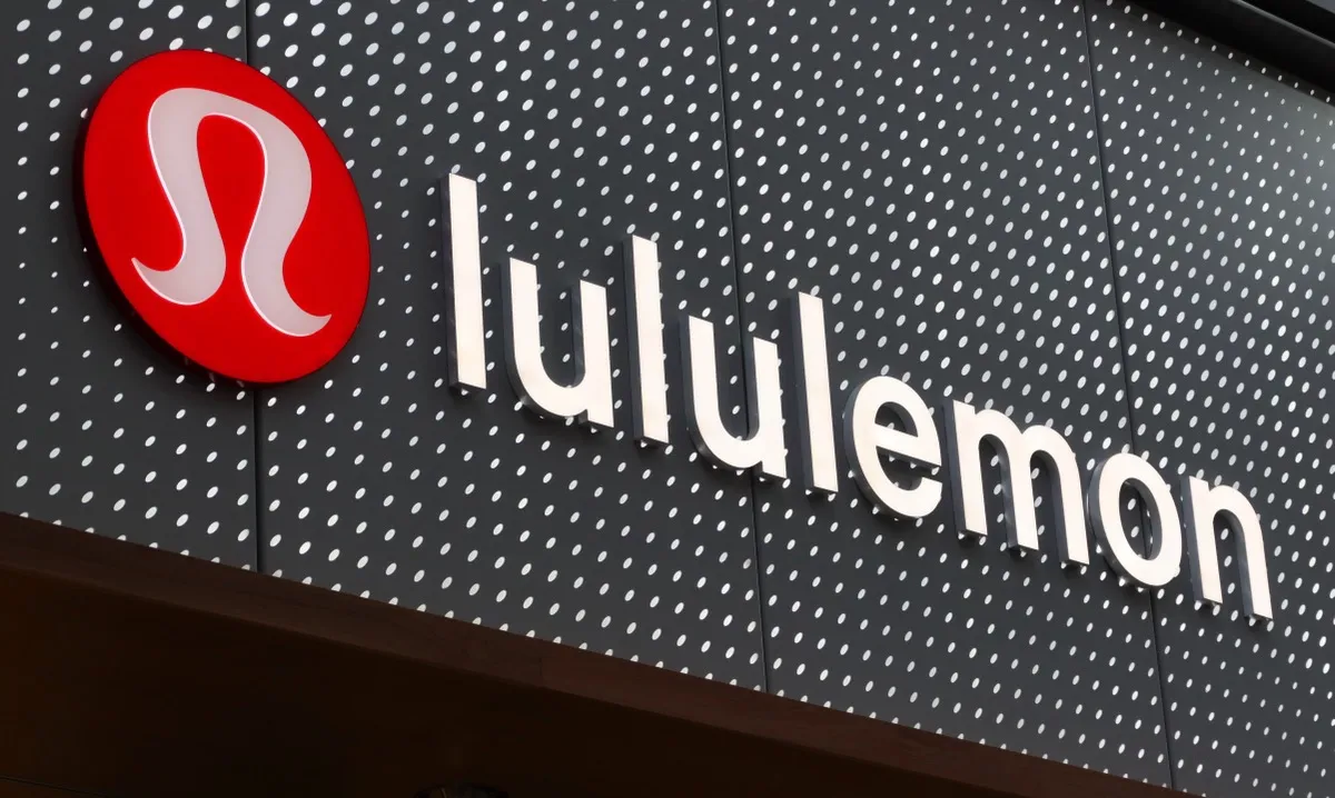 The logo for Lululemon on a storefront in New York