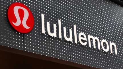 The logo for Lululemon on a storefront in New York