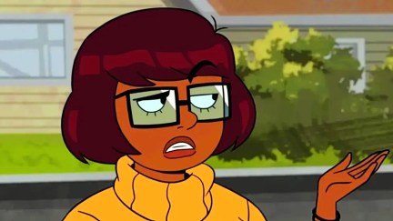 Velma Dinkley (Mindy Kaling) shrugging in Velma