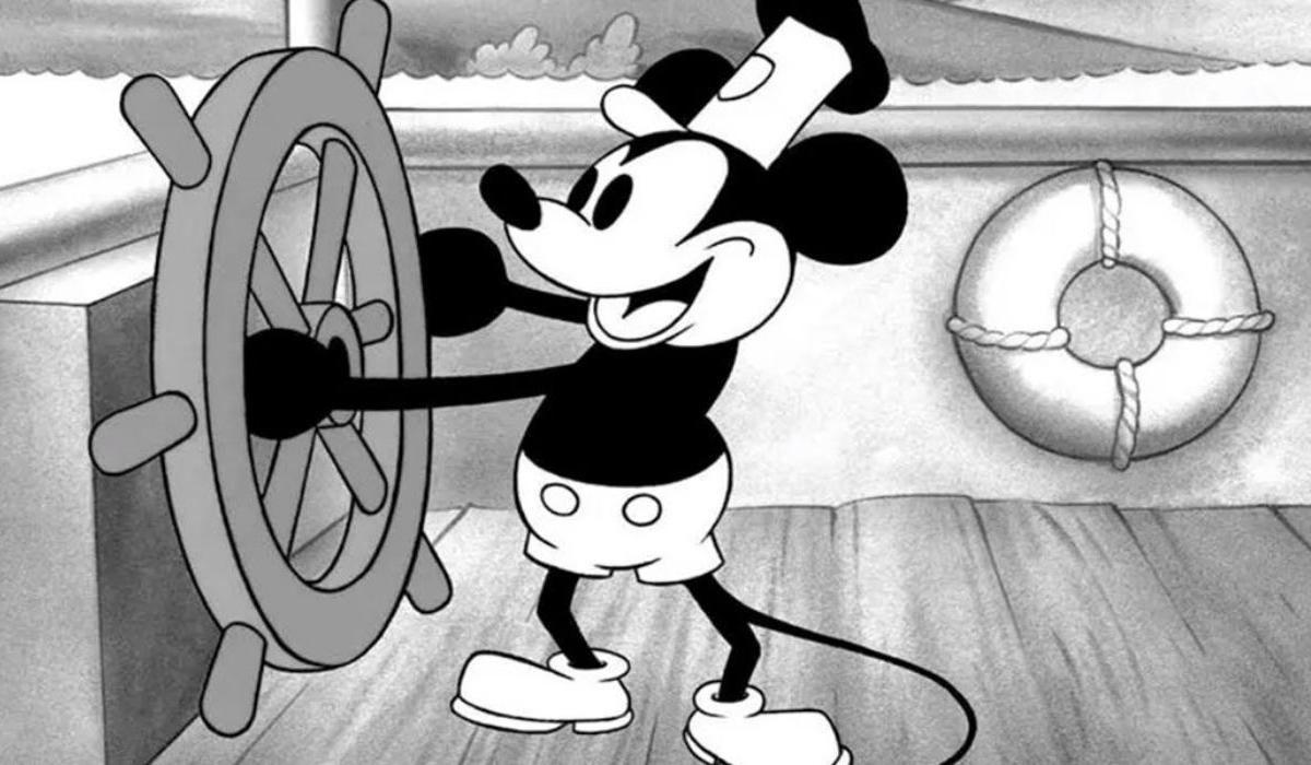 Steamboat Willie steering the ship