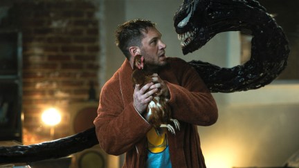 Eddie Brock (Tom Hardy) protects a chicken from Venom in 'Venom: Let There Be Carnage'