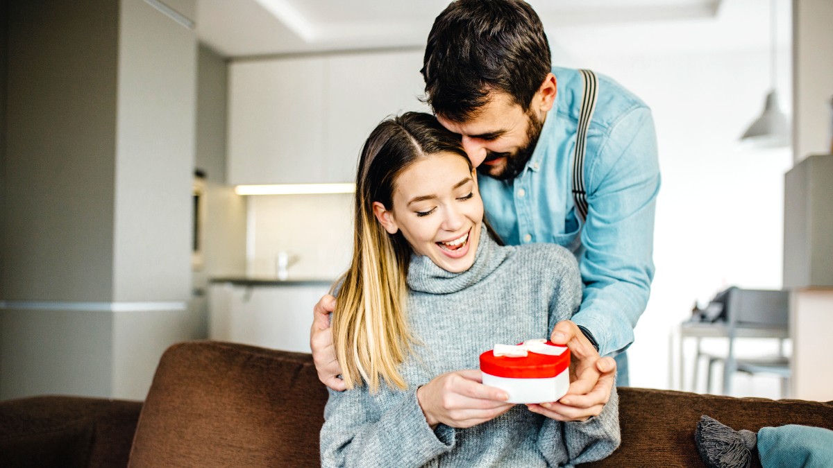A couple exchanging Valentine's Day gifts