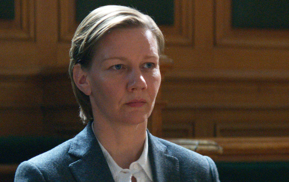Sandra Huller as Sandra sitting in court in Anatomy of a Fall