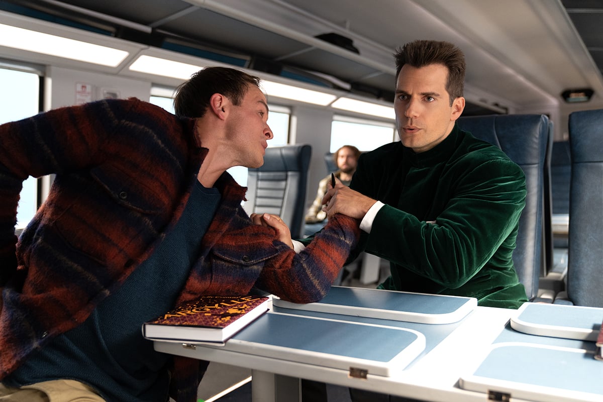 Henry Cavill taking out a bad guy as Agent Argylle