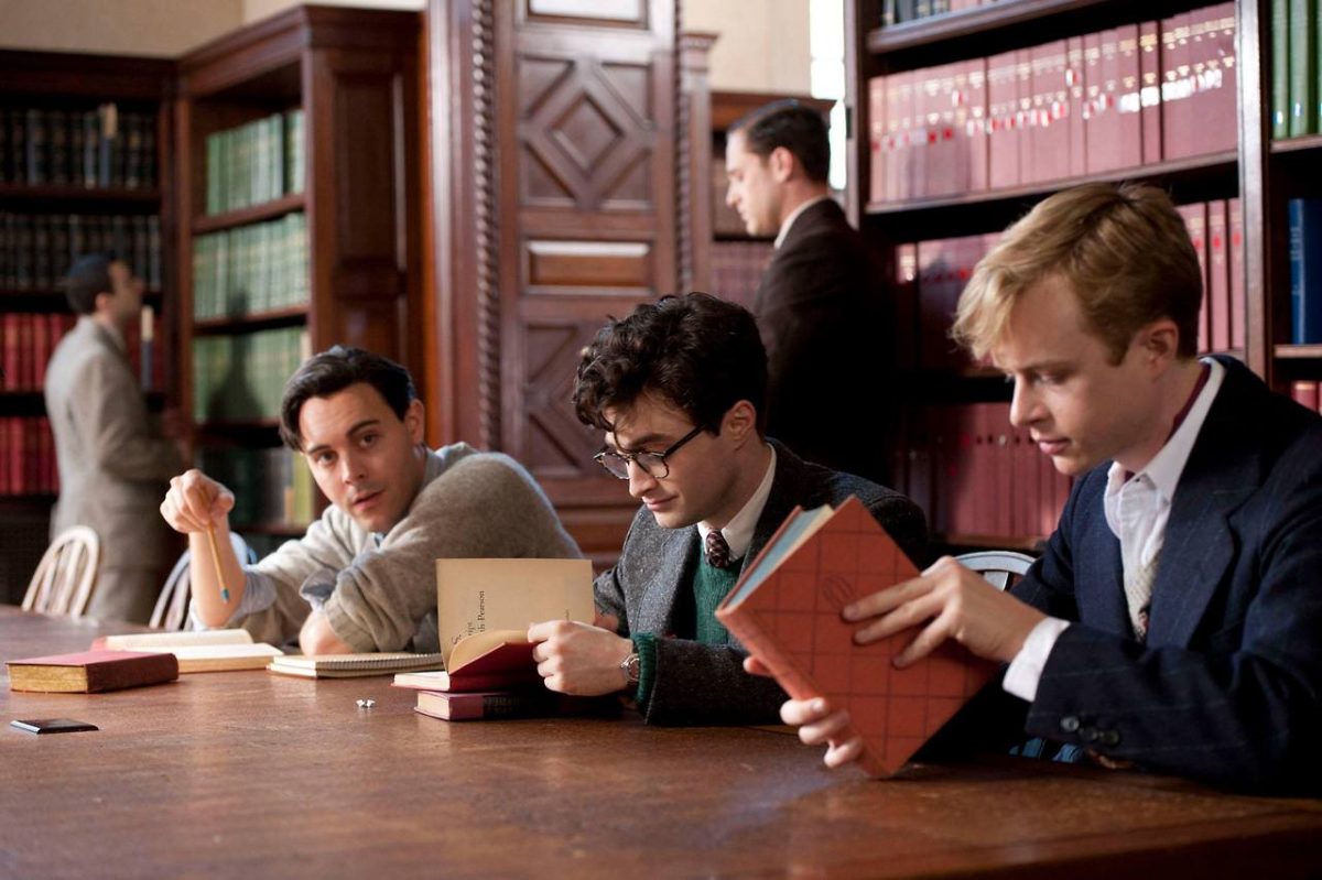 A group of students read books in a school library.