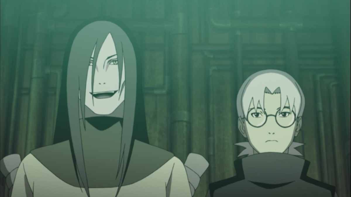 Orochimaru and Kabuto stand next to each other, with the former smiling in "Nartuo"