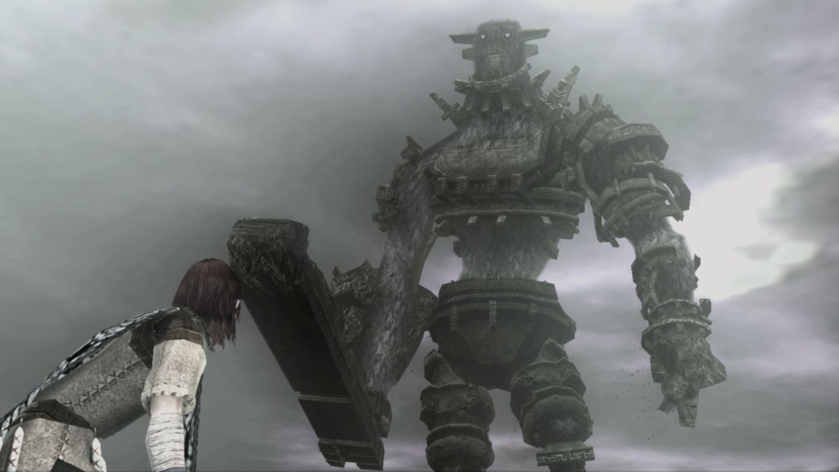A boy faces off against a towering giant in "Shadow of the Colossus"