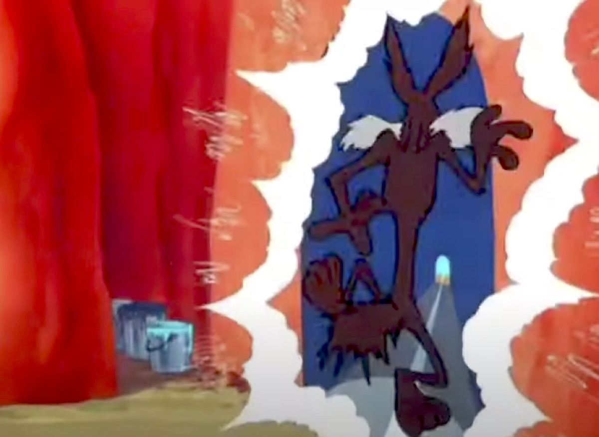 Wile E Coyote runs into a wall painted like a tunnel.