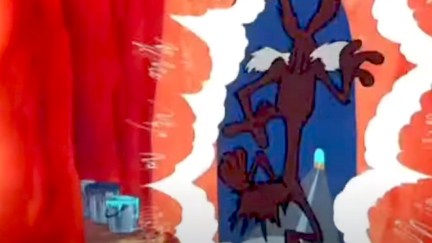 Wile E Coyote runs into a wall painted like a tunnel.