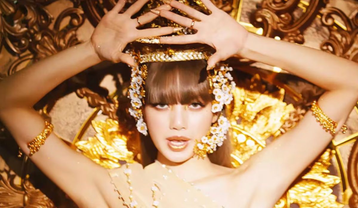 BLACKPINK's Lisa wearing a traditional costume from her native Thailand in the music video for her debut song "Lalisa"