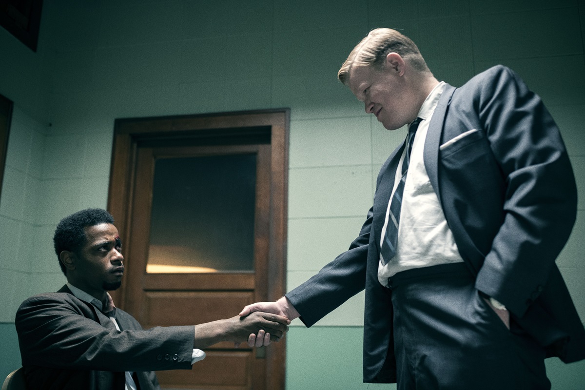 LaKeith Stanfield and Jesse Plemons shake hands in Judas and the Black Messiah