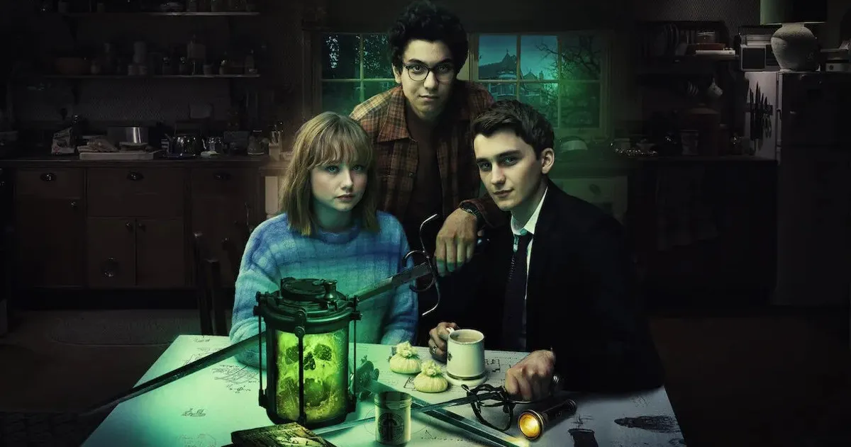 Key art for Netflix Original Series 'Lockwood & Co.' featuring the cast sitting at a table in the dark.