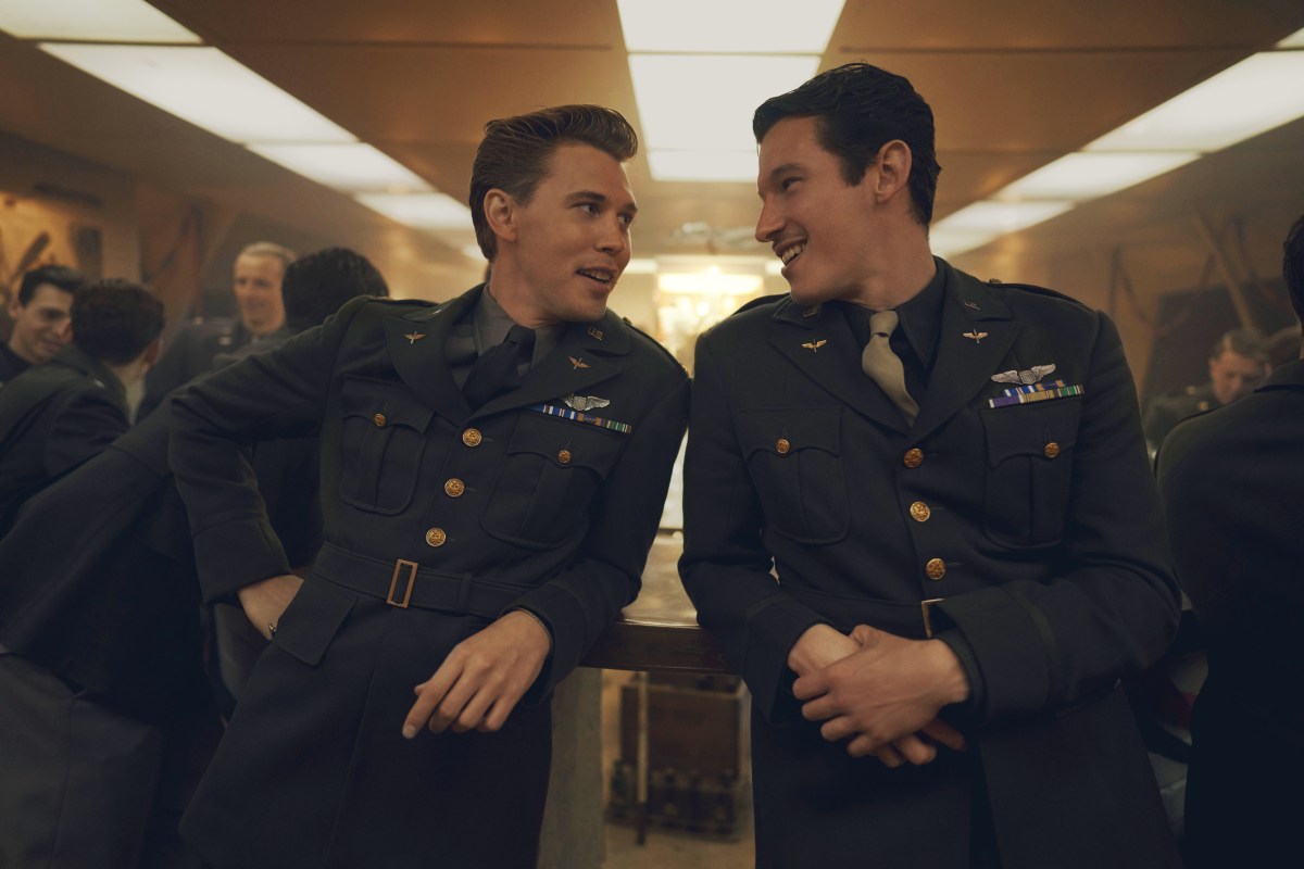 Buck and Bucky standing next to each other with their suits on