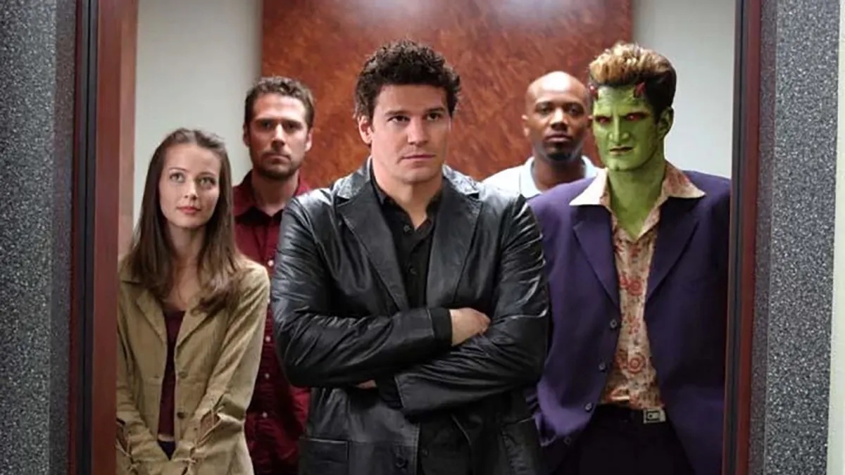 The cast of Angel in an elevator.