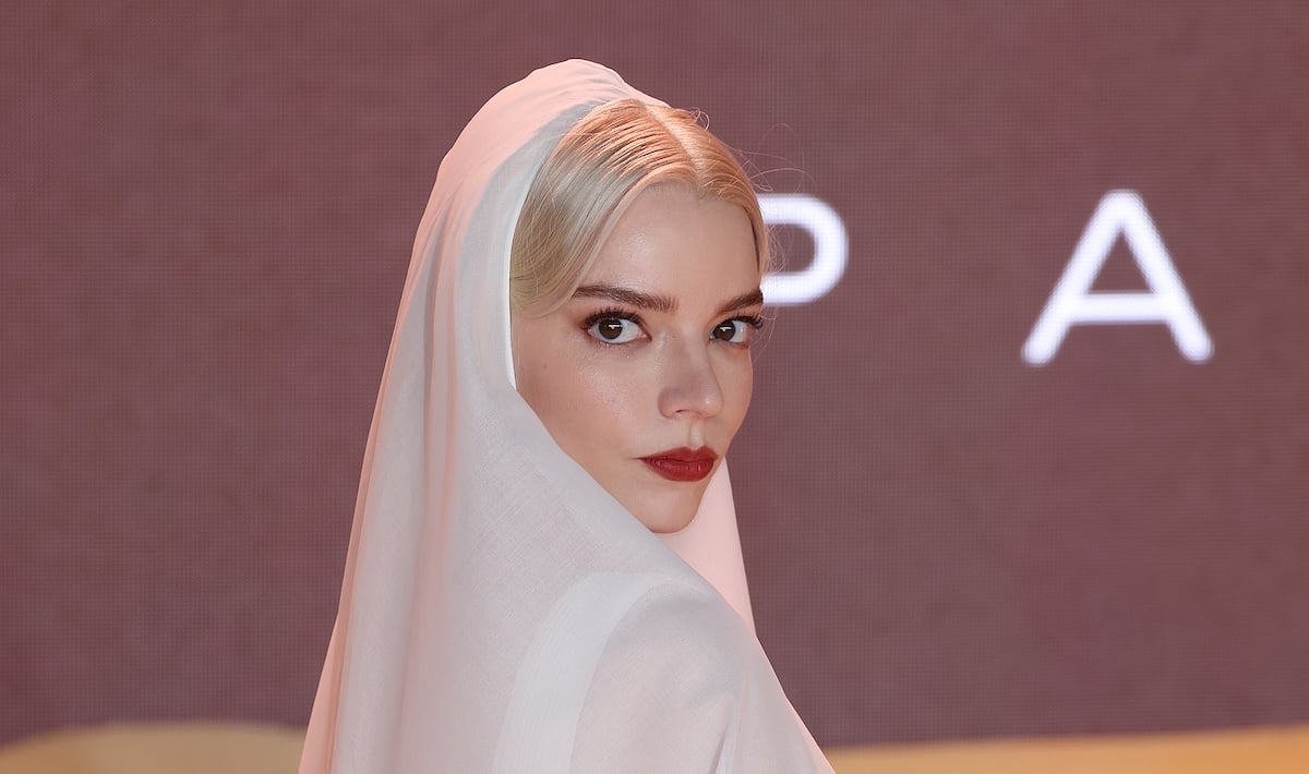 Anya Taylor-Joy wears a white veil against a grey background at the Dune: Part Two premiere.