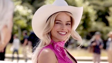 Barbie smiling in a 10-gallon hat.