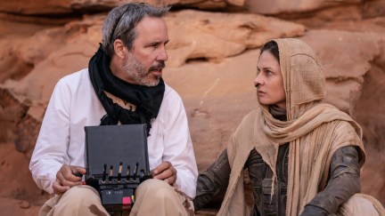 Denis Villeneuve and Rebecca Ferguson on the set of Dune: Part 2, talking between takes.
