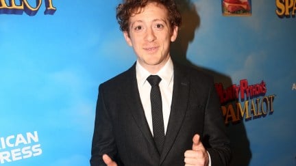 Ethan Slater standing giving the thumbs up at the opening night of Spamalot