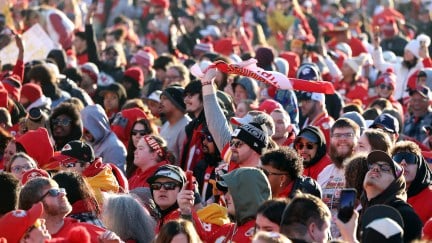 A large crowd of Kansas City Chiefs fans cheer during the Super Bowl victory parade