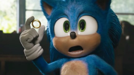 Sonic the Hedgehog holding up a gold ring